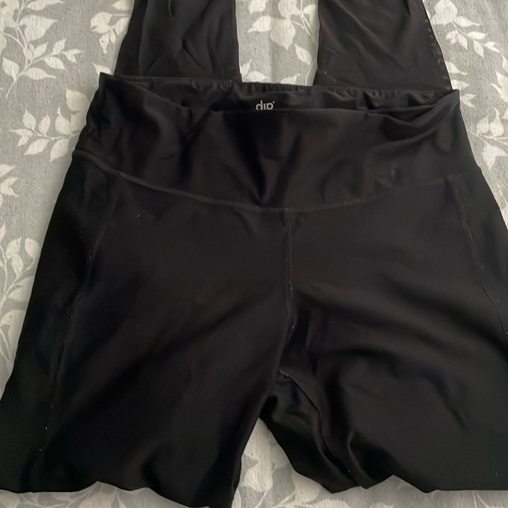 black leggings worn